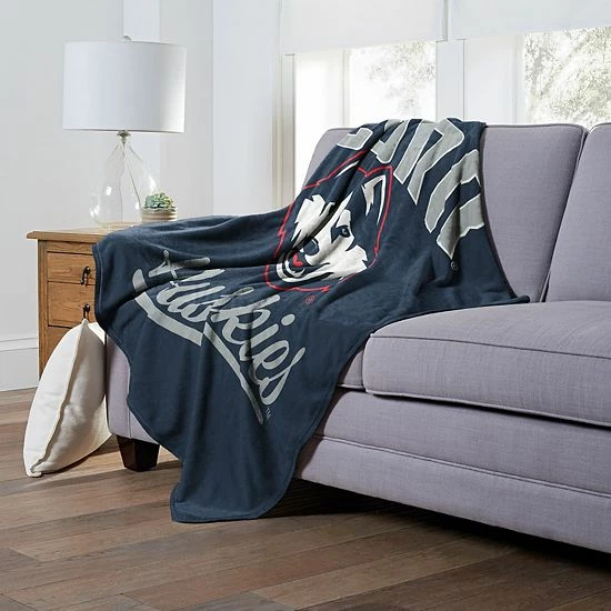 The Northwest UConn Huskies Alumni Silk-Touch Throw Blanket - Image 2