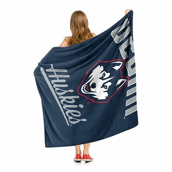 The Northwest UConn Huskies Alumni Silk-Touch Throw Blanket - Image 4